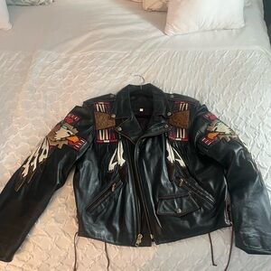 Black Bomber Jacket with Glossy Finish and Decorative Patches